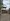 Pre-owned 4 bedroom House with 9 row houses for rent . Big backyard . With water supply.