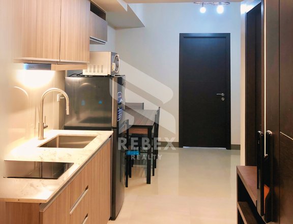 Fully-furnished 1-Bedroom Park McKinley West Unit For Lease Facing Forbes Park and Makati Skyline