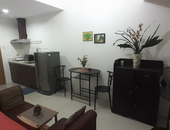 A studio-type condo unit fronting the Manila Bay and the US Embassy.