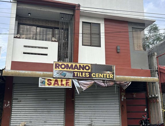 TWO STOREY RESIDENTIAL WITH TWO COMMERCIAL SPACES BELOW