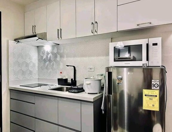 SPACIOUS STUDIO UNIT CONDOMINIUM FOR SALE IN SUNTRUST CAPITOL PLAZA QUEZON CITY NEAR SCHOOLS