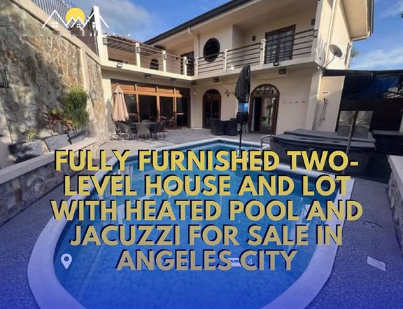 FULLY FURNISHED TWO-LEVEL HOUSE AND LOT WITH HEATED POOL AND JACUZZI FOR SALE IN ANGELES CITY