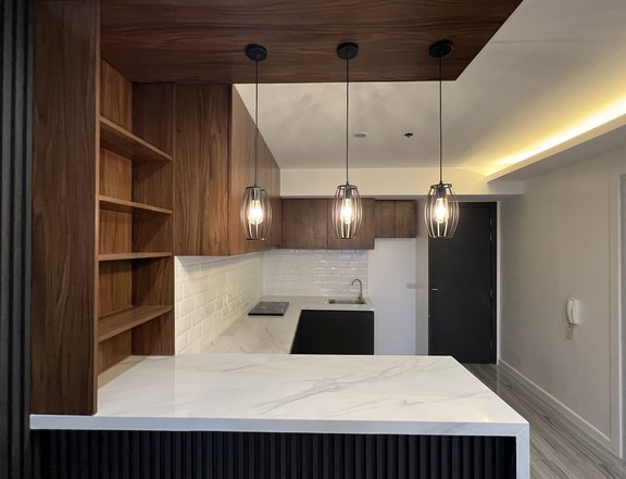 Remodeled 2-BR Corner Unit at Knightsbridge Residences Makati
