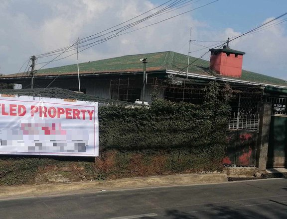 Titled property (with 2 houses-3 storey each, good for rentals or transient houses) in Baguio