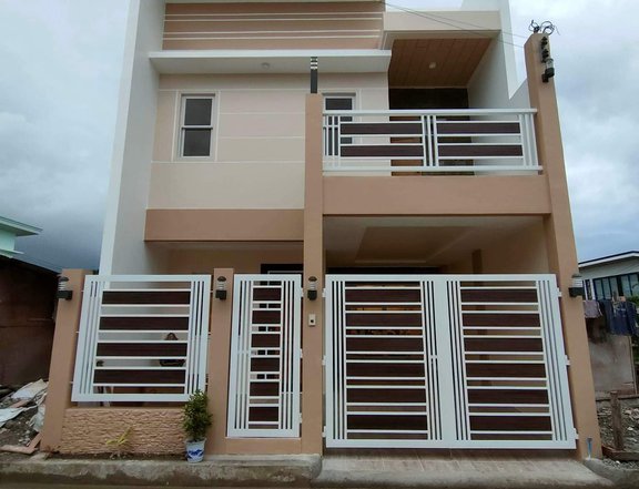 2 storey house and lot with 4 rooms and 4 cr with carport and balcony.