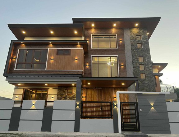 A newly constructed corner residence  situated in a highly exclusive