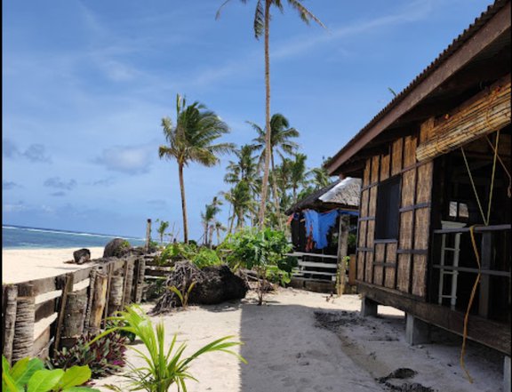 A 3313sqm beachfront property with three houses, 2 concrete and 1 Kubo. Has water & sewage system