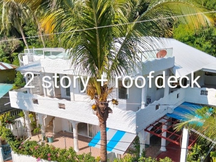 Solidly constructed 3 apt. building and lot for sale.