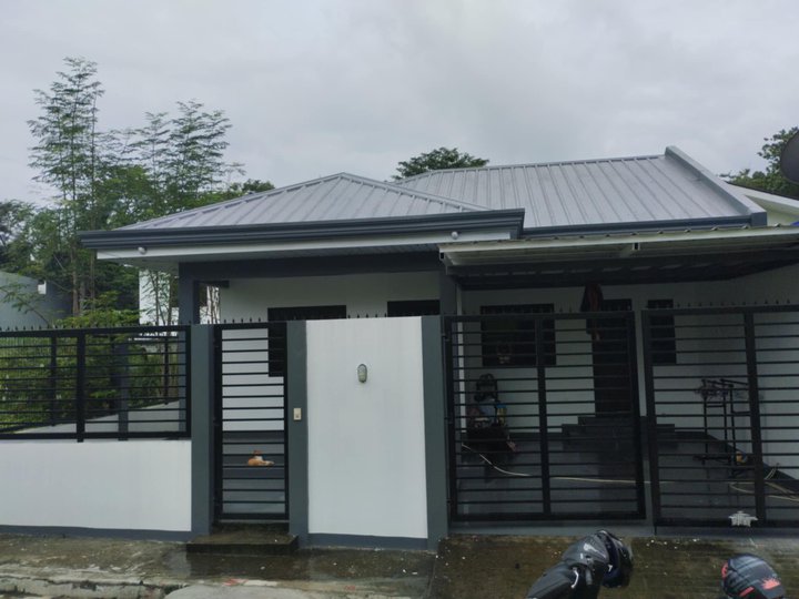 A stylish 3-bedroom Rizal bungalow, ready for a second-story expansion, offers comfortable living.