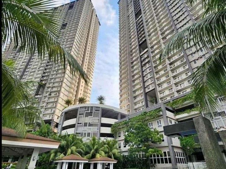 2 Bedroom Unit with Balcony and Parking for Sale in Zinnia Towers Roosevelt Quezon City