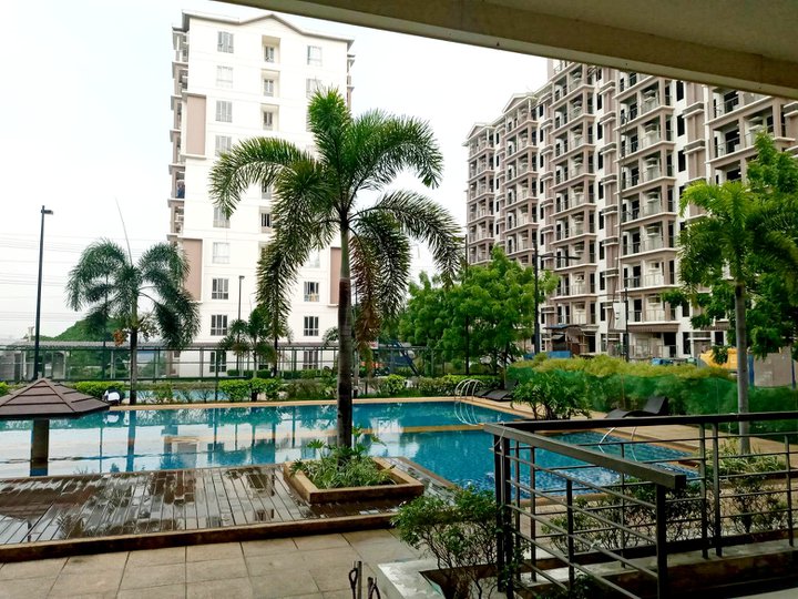 Practical Mid-Rise Condominiums located along Quirino Highway .
