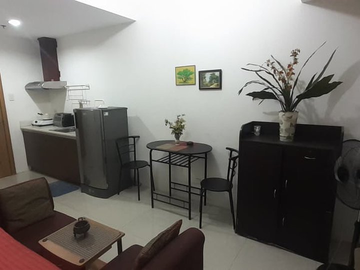 A studio-type condo unit fronting the Manila Bay and the US Embassy.