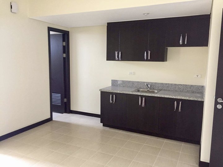 CONDO 2 BEDROOM RENT TO OWN RFO IN SAN LORENZO PLACE MAKATI