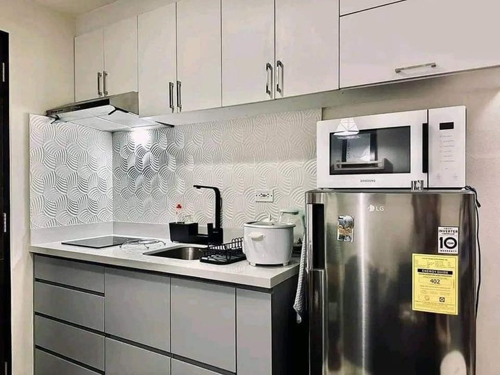 SPACIOUS STUDIO UNIT CONDOMINIUM FOR SALE IN SUNTRUST CAPITOL PLAZA QUEZON CITY NEAR SCHOOLS