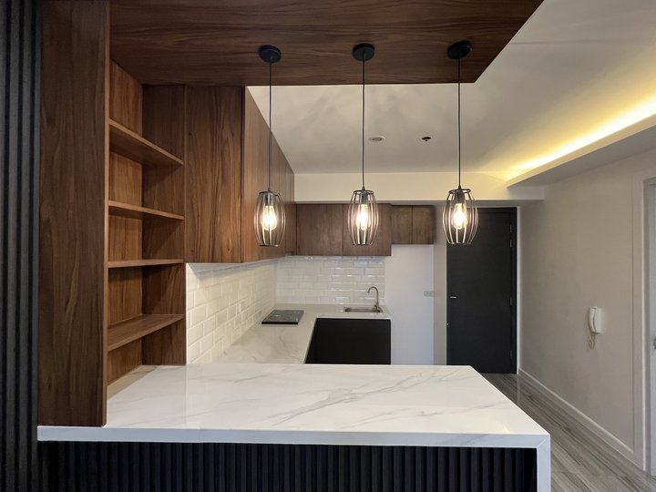 Remodeled 2-BR Corner Unit at Knightsbridge Residences Makati