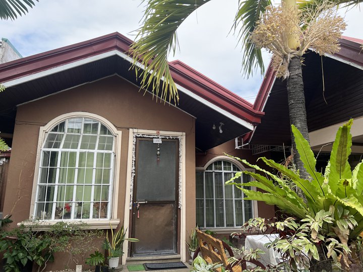house and lot bungalow type with attic and a maids quarter with own t&b