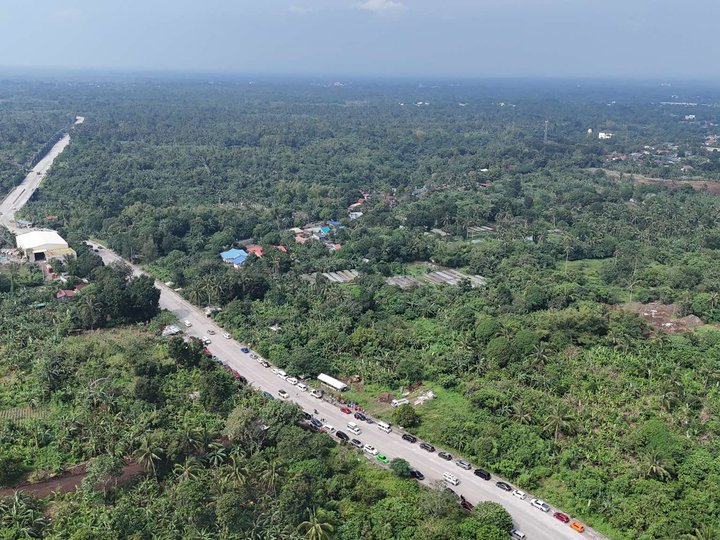 Residential and Commercial lot along Eastwest road in Amadeo