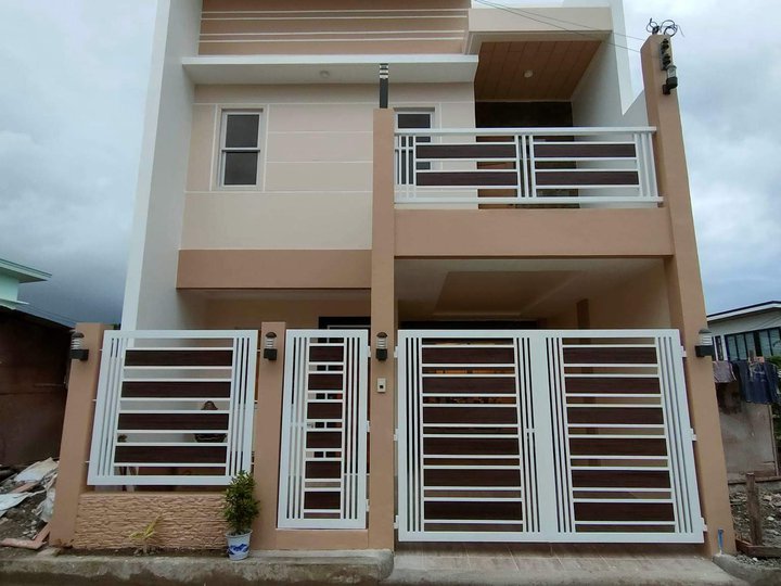 2 storey house and lot with 4 rooms and 4 cr with carport and balcony.