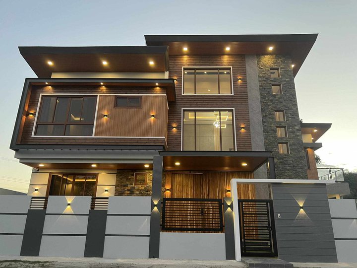 A newly constructed corner residence  situated in a highly exclusive