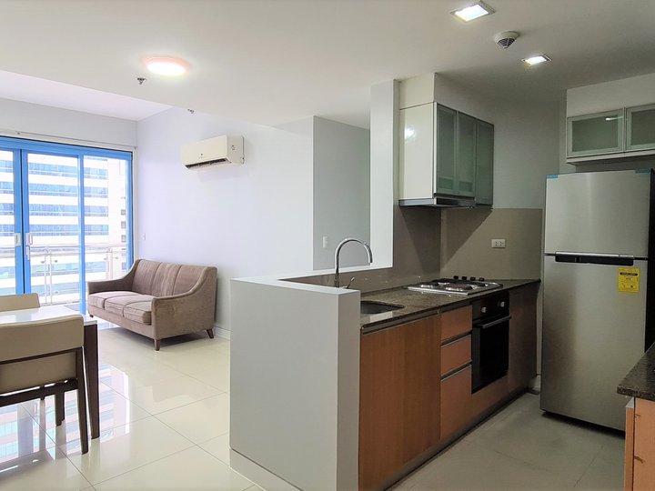 2 Bedroom Corner Unit with Maid's Room for Rent in Three Central Makati City