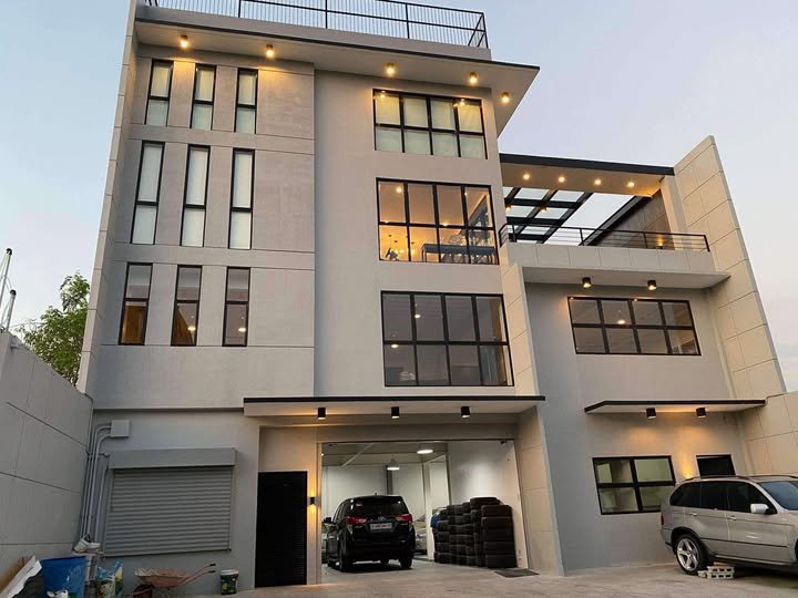 4-Storey Residential Building with Roof Deck